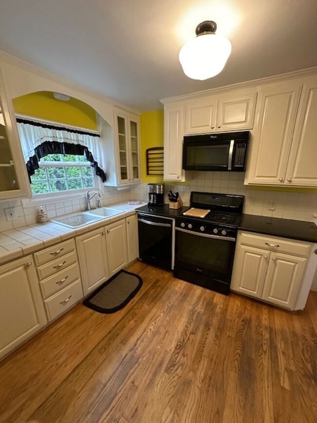 Building Photo - Furnished Story Book Home near Campus with...