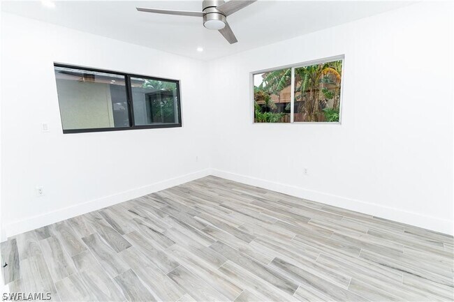 Building Photo - 6499 Royal Woods Dr