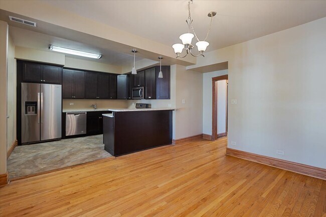 Building Photo - 1448 E 72nd Pl