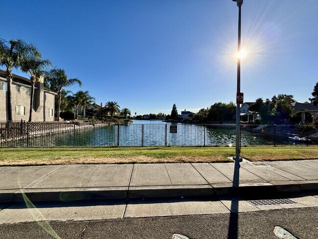 Building Photo - Lake views from your front yard, corner lot, shopping just blocks away and a beautiful place to c...