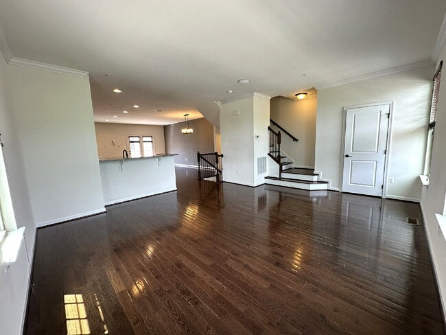 Building Photo - LEASE PENDING! Three-Floor End Unit Townho...