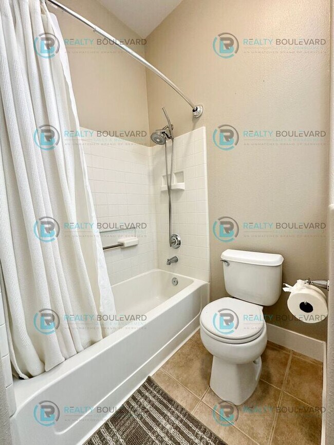 Building Photo - Open Kitchen, Expansive Living, and Covered Patio in Tranquil South Reno Near Trails, Parks & Sho...