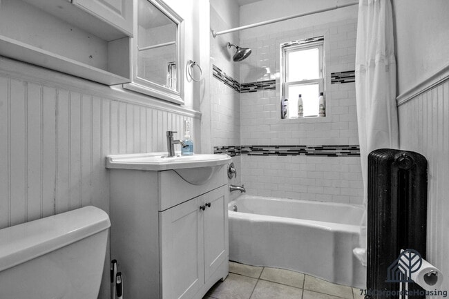 Building Photo - Furnished 2-Bedroom First-Floor Apartment Near Elmwood Village