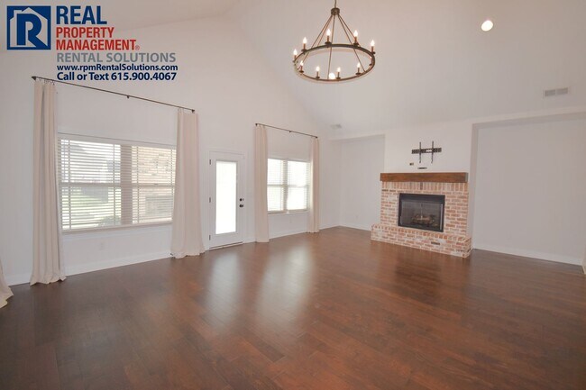 Building Photo - All brick 4 bedroom home plus Bonus room! Garage and covered patio!