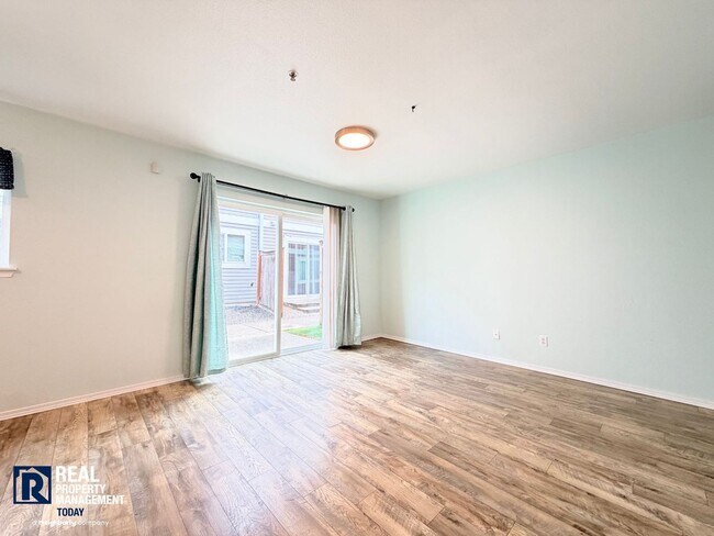 Building Photo - Spacious 4-Bedroom Townhome in Alicia Meadows | Garage, Patio & Pet Friendly