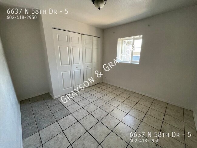 Building Photo - 6637 N 58th Dr