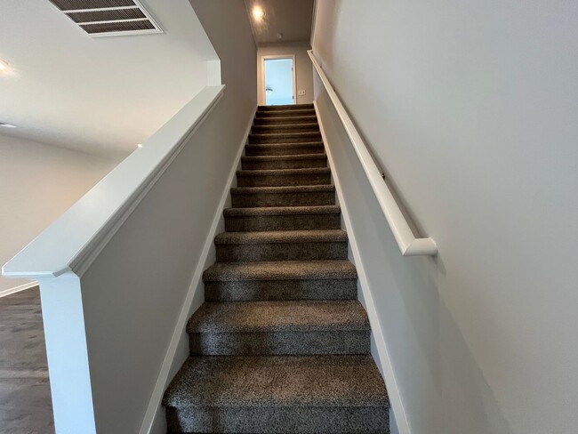 Building Photo - New 4/3 Townhome Available Now