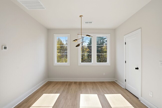 Building Photo - Bishop at Briar Creek, an end-unit townhome