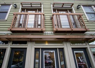 Building Photo - Corner 2 Bedroom with DW, W/D, Fireplace + Juliette Balcony!