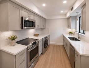 Building Photo - Modern Pet-Friendly 2BR in Washington Square with Parking, Balcony & In-Unit Laundry