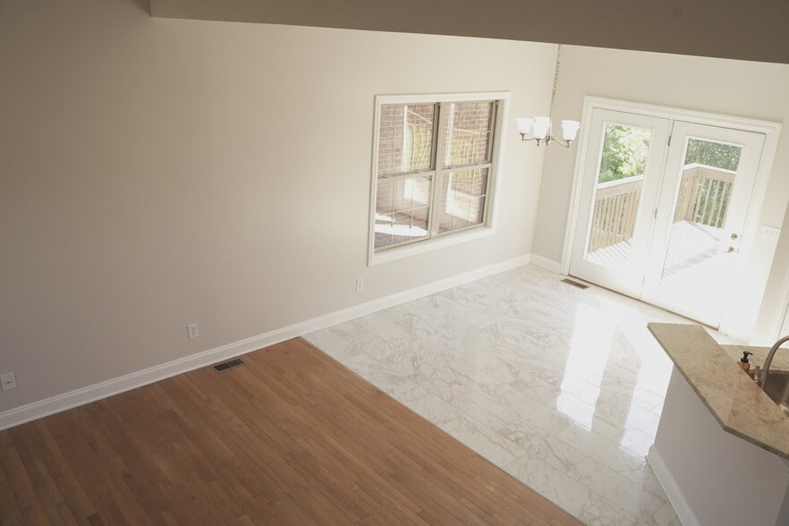 Second Story View of First Floor Family Room, Dinning and Kitchen Bar - 393 Hays Blvd