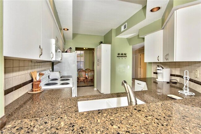 Building Photo - 4200 Sawgrass Point Dr