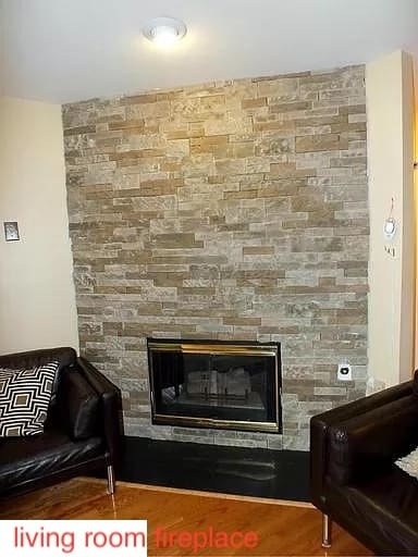 Living room custom fireplace - 11809 Rockaway Ln