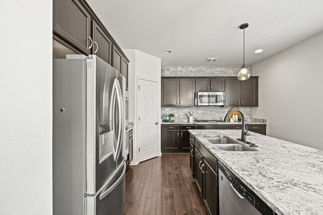 Building Photo - Beautiful 5 Bedroom Home- Move in Ready- C...