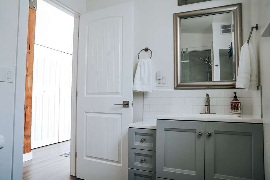 master bath with plenty of storage - 525 8th Ave W