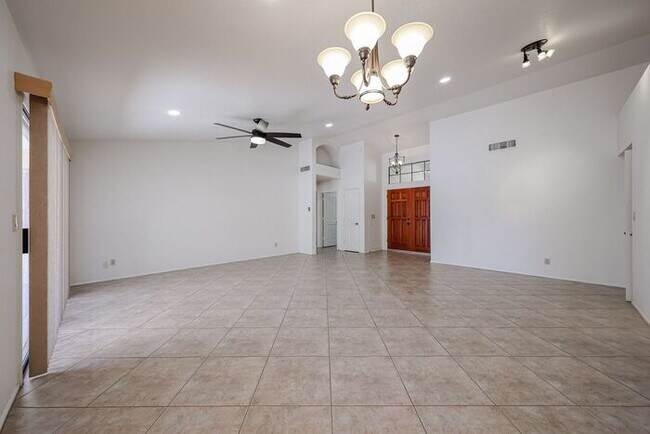 Building Photo - Welcome to this stunning 4-bedroom, 2-bath...