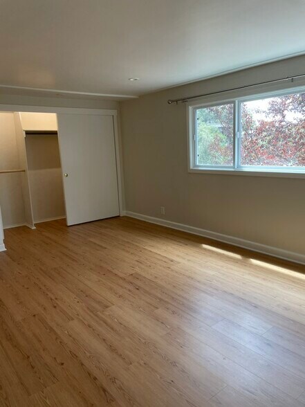 Extra large primary bedroom with long closet where the light is turned on in this photo. - 101 Granlee Rd
