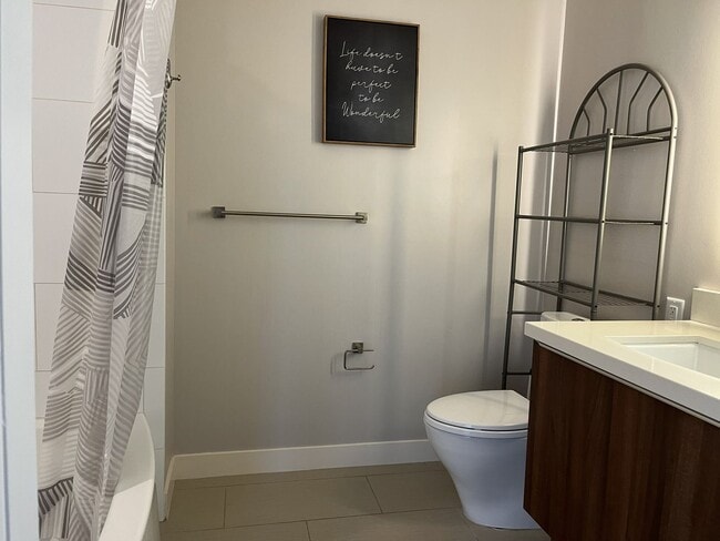 Building Photo - Symphony - 2 bedroom, 2 baths Condo, with 2 parking stalls - Avail now!