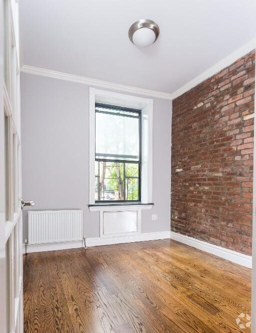 Building Photo - 47 1/2 E 1st St