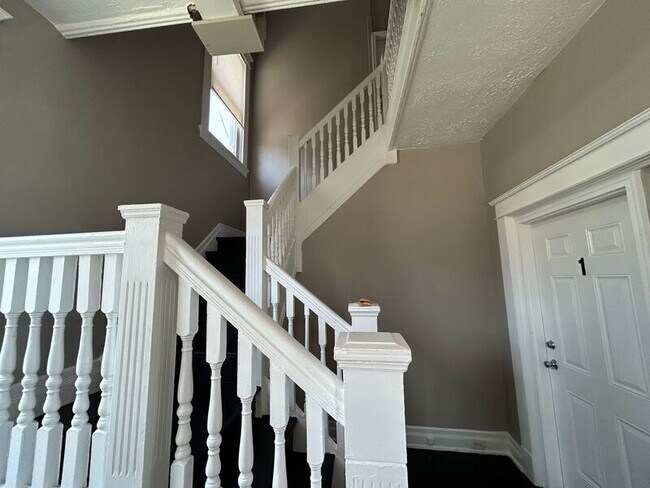 Building Photo - 1214 Iliff Ave