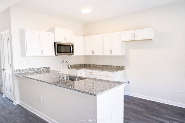 Building Photo - Three bedroom, 2.5 bath townhome in Whitsett