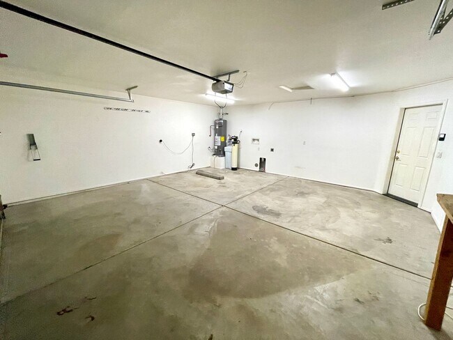 Building Photo - Inviting 3 Bedroom Home with RV Parking an...