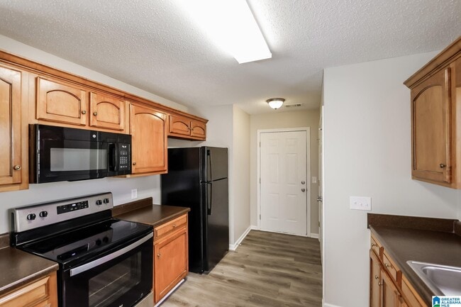 Building Photo - 1597315973 Stone Ridge Cir
