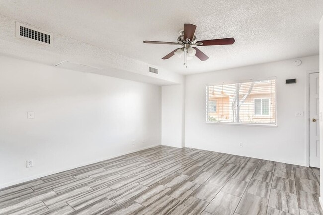 Building Photo - ADORABLE TOWN HOME with BALCONY and a GREAT SIZE PATIO/"BACKYARD"