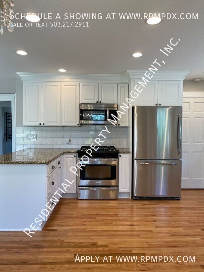 Building Photo - 7065 N Woolsey Ave