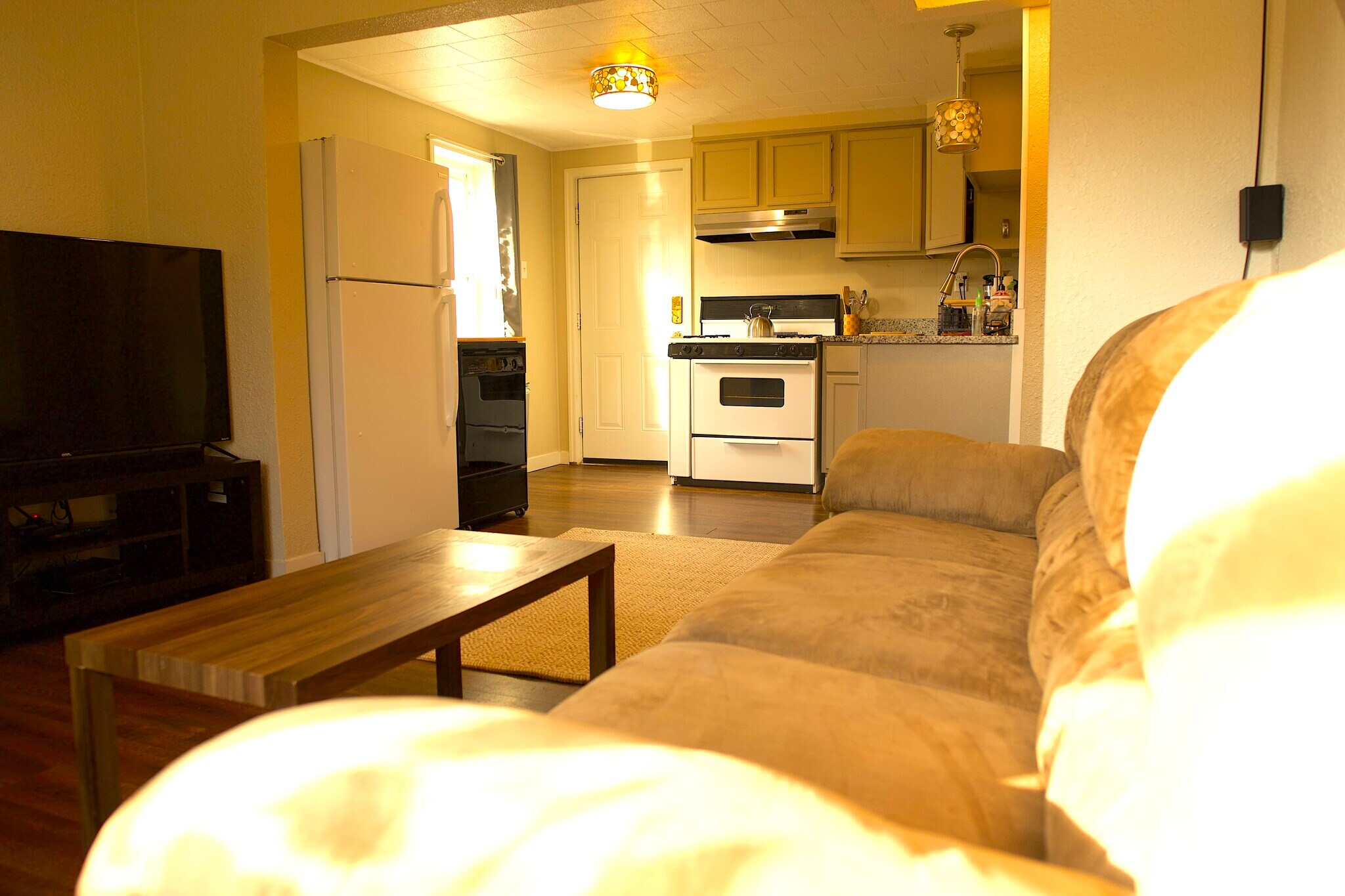 Bright & Comfortable Living Area with 55" Smart TV - 10207 Oak Ave