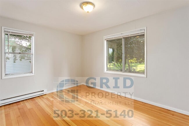Building Photo - Charming 2BR House with Garage & Private Patio in Vancouver!