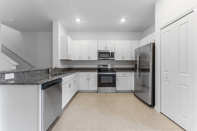 Building Photo - Luxury 3 BR + LOFT/2.5BA/1 Car Garage Luxury Townhome in the highly desirable GATED community of ...