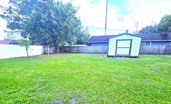 Building Photo - Stunning 4 Bed 1 Bath Block Home on Fenced Lot with Fruit Trees