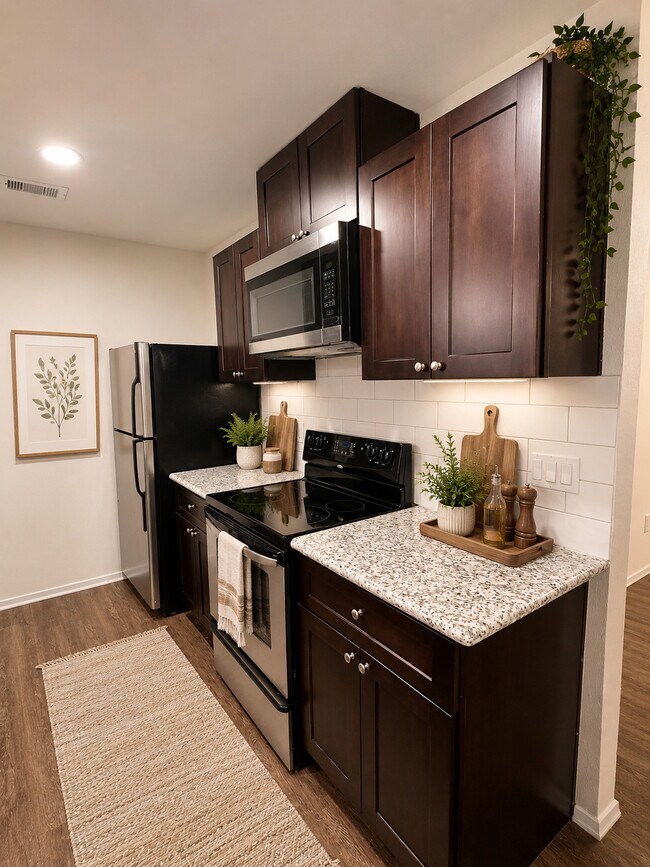 Granite Counters & Tile Backsplash - Porter Plaza Apartments