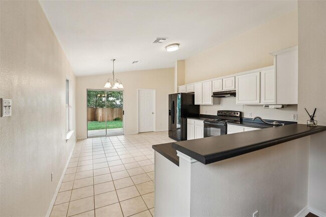 Building Photo - 11201 Canterbury Tales Ln