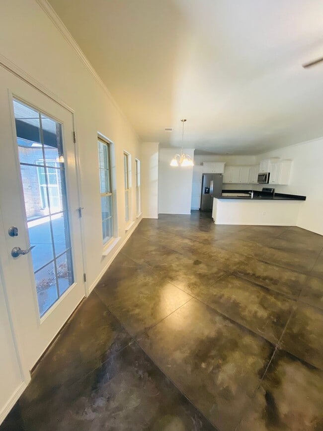 Building Photo - Stunning New 3/2 Townhomes