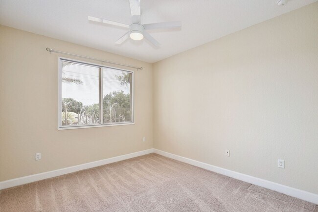 Building Photo - Stylish and Spacious 3/2.5 Townhome with Premium Features and Community Pools