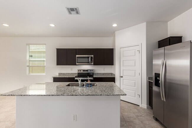 Building Photo - Brand New - Never Lived In 4 Bedroom / 2 B...