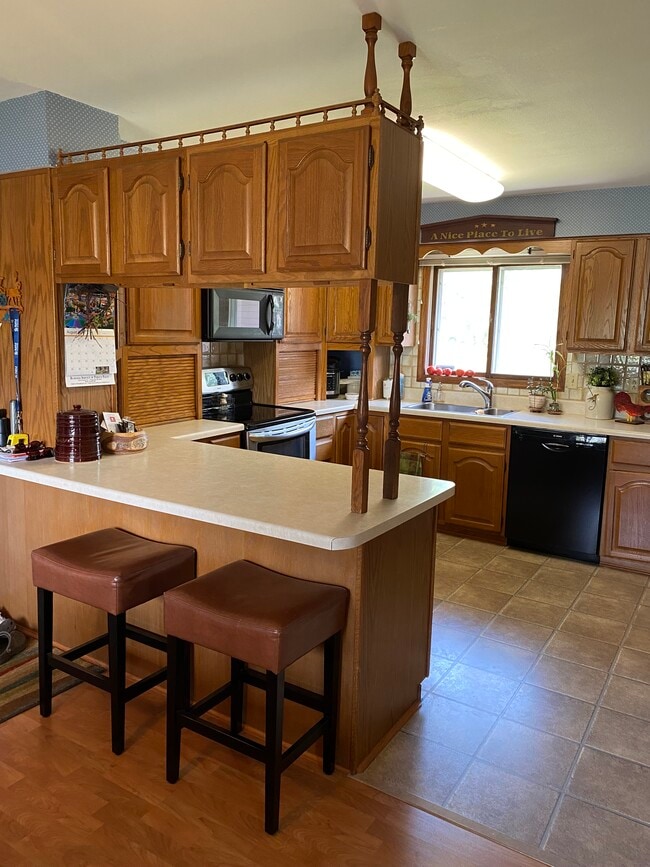 Expansive kitchen with lots of prep space - 210 Elm Ave S