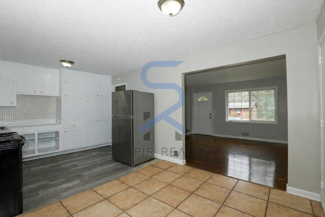 Building Photo - Timeless Ranch Charm in a Vibrant, Peaceful Corner of South River Gardens