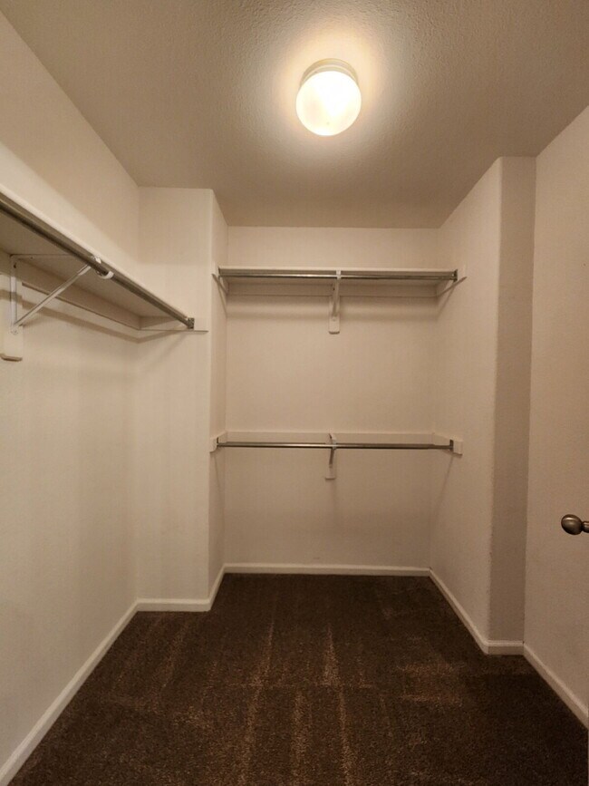 Building Photo - Spacious Two-Suite Townhome With Garage, Fireplace And Community Pool