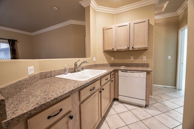 Building Photo - Cute 2 Bedroom Condo with 2 Car Garage located in a Guard Gated Community in Green Valley!