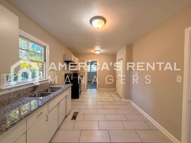 Building Photo - Coming Soon! View NOW! Cozy Anniston Home ...