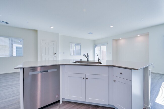 Building Photo - NW 3 Bedroom Townhouse!! Gated Community Pool!! 2 Car Garage!!! No Carpet downstairs.