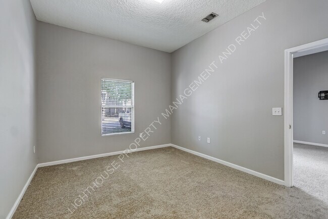 Building Photo - 6788 Manotak Oaks Dr