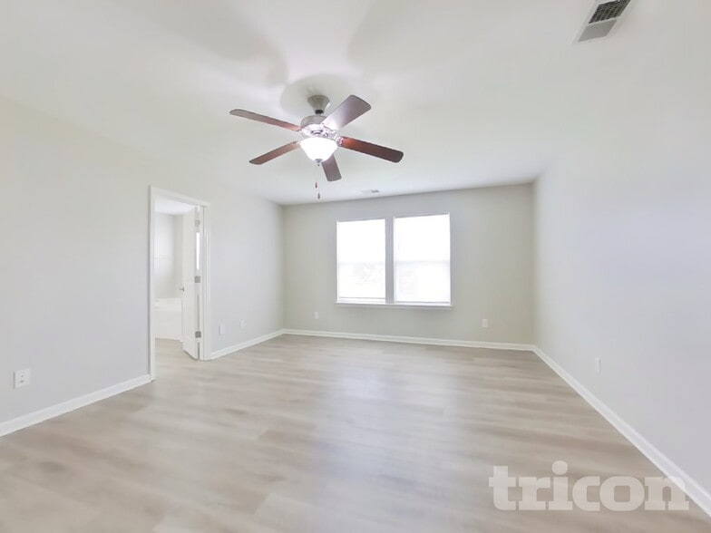 Building Photo - 6909 Barefoot Forest Dr