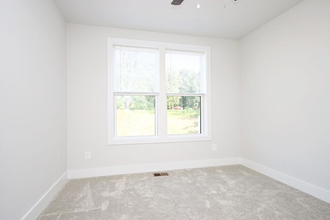 Building Photo - Pet-Friendly Brookhill Commons Townhome-Style Condo