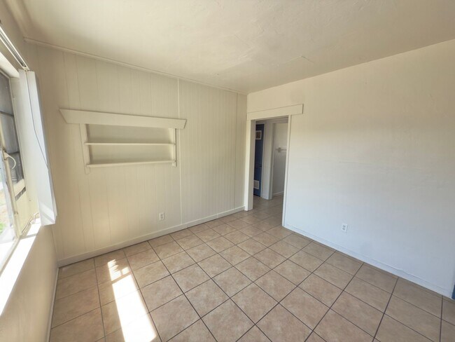 Building Photo - Two Bedroom w/ A/C, Yard and Carport