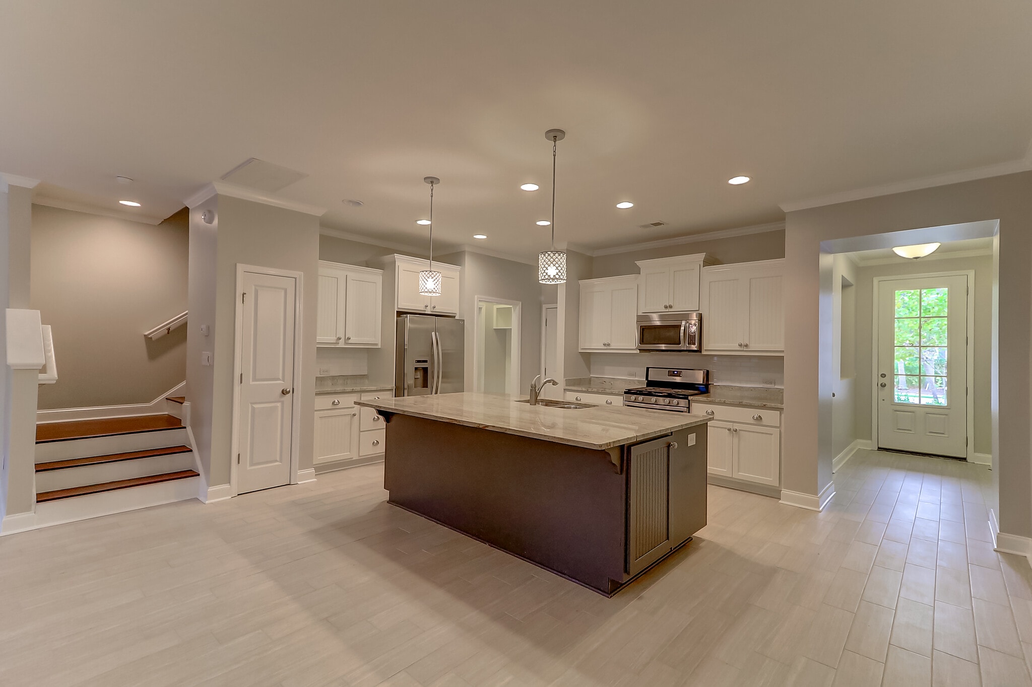 Kitchen and stairwell - 2069 Kings Gate Ln