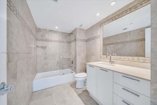 Building Photo - 18911 Collins Ave